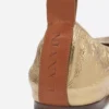Les ballerines plates en cuir métallisé