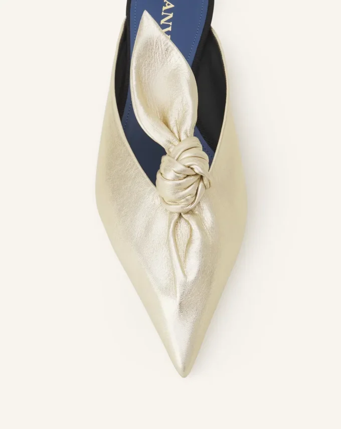 Mule Midnight Step Bow en cuir métallisé