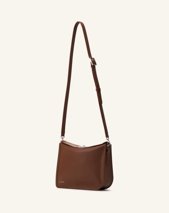 Pochette asymétrique en cuir Compagnon