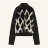 Pull à col roulé en laine et cuir intarsia