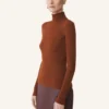 Pull à col roulé en laine mérinos et soie