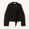 Veste asymétrique en laine bouclée