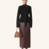 Veste asymétrique en laine bouclée