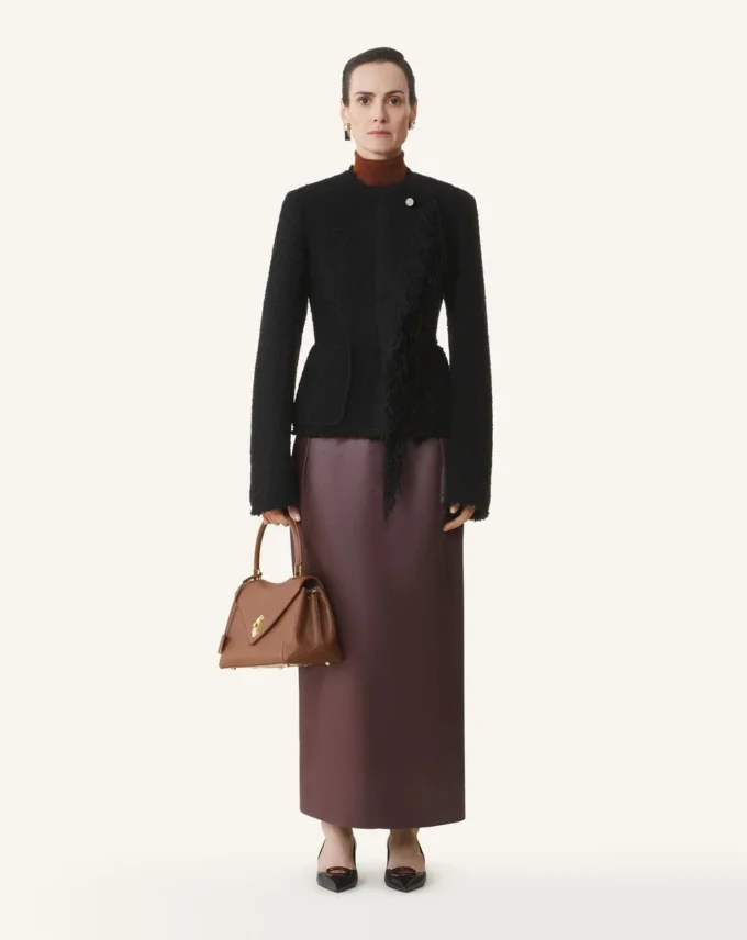 Veste asymétrique en laine bouclée