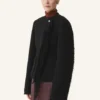 Veste asymétrique en laine bouclée