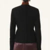 Veste asymétrique en laine bouclée