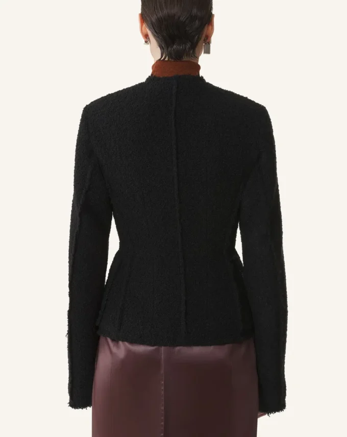 Veste asymétrique en laine bouclée
