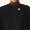Veste asymétrique en laine bouclée