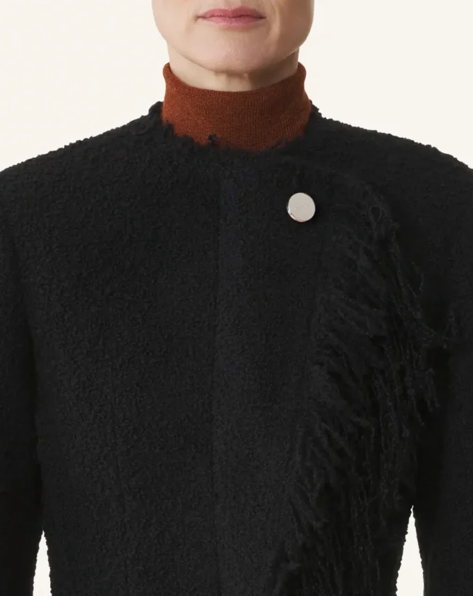 Veste asymétrique en laine bouclée
